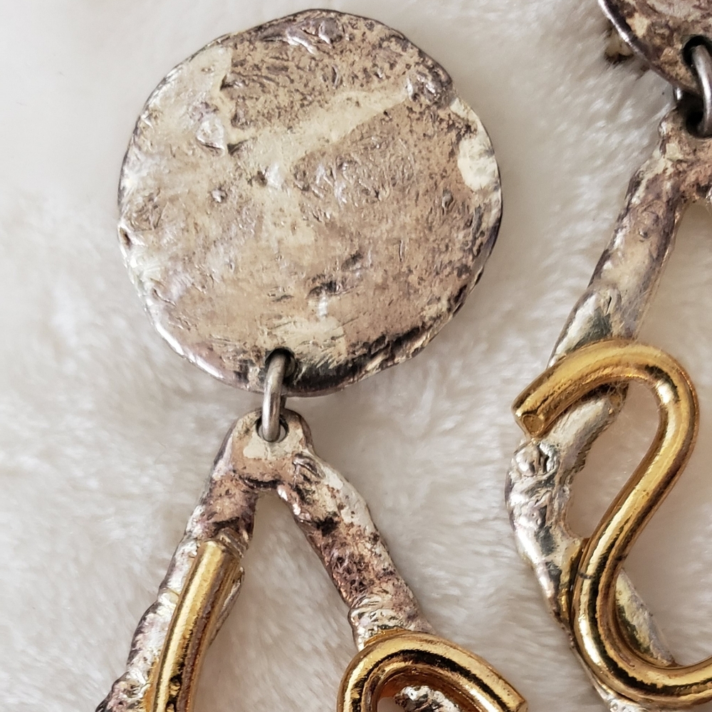 Distinctive Gold and Silver Clip-on Statement Earrings with Unique Design - Picture 4 of 5